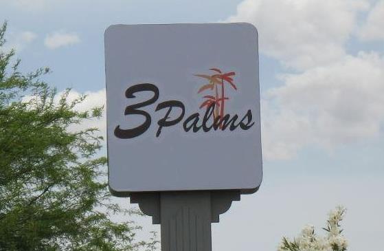 Three Palms signage